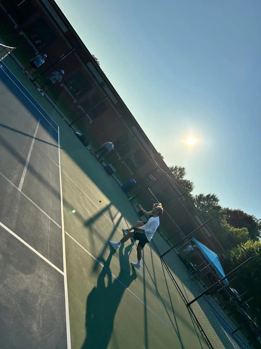 Pickleball players taking part in an outdoor doubles rally